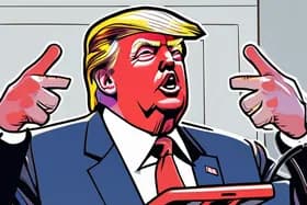 Trump Flips Off Heckler; White House Calls Critic "Lunatic